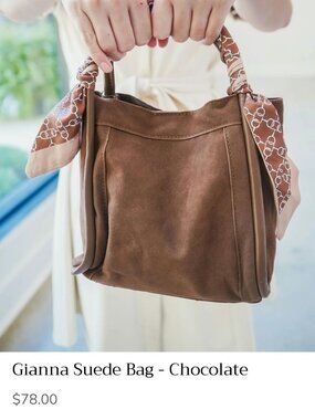 Faux suede purse, new, Has smaller bag that fits inside. Scarf attached.